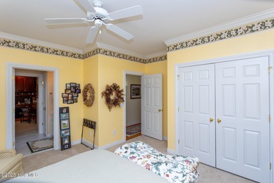 Welcome to this elegant, all-brick custom home built by on Pinewild Country Club of Pinehurst in North Carolina - for sale on GolfHomes.com, golf home, golf lot