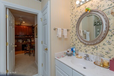 Welcome to this elegant, all-brick custom home built by on Pinewild Country Club of Pinehurst in North Carolina - for sale on GolfHomes.com, golf home, golf lot