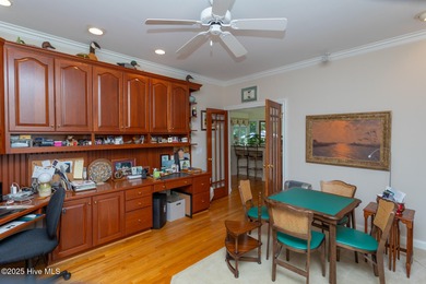 Welcome to this elegant, all-brick custom home built by on Pinewild Country Club of Pinehurst in North Carolina - for sale on GolfHomes.com, golf home, golf lot