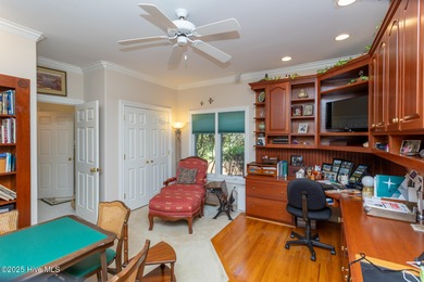 Welcome to this elegant, all-brick custom home built by on Pinewild Country Club of Pinehurst in North Carolina - for sale on GolfHomes.com, golf home, golf lot