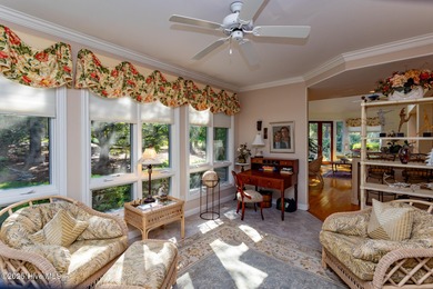 Welcome to this elegant, all-brick custom home built by on Pinewild Country Club of Pinehurst in North Carolina - for sale on GolfHomes.com, golf home, golf lot