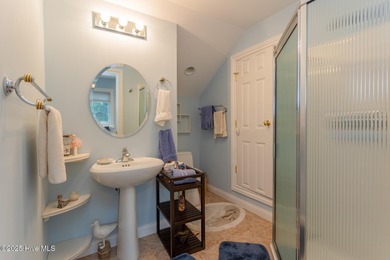 Welcome to this elegant, all-brick custom home built by on Pinewild Country Club of Pinehurst in North Carolina - for sale on GolfHomes.com, golf home, golf lot