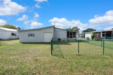 This charming 2 bed 2 bath golf course home features an open on High Point Golf Club, Inc. in Florida - for sale on GolfHomes.com, golf home, golf lot