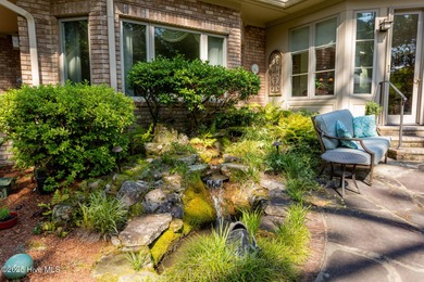 Welcome to this elegant, all-brick custom home built by on Pinewild Country Club of Pinehurst in North Carolina - for sale on GolfHomes.com, golf home, golf lot