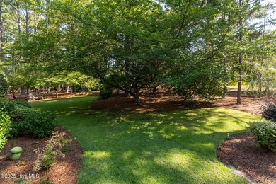 Welcome to this elegant, all-brick custom home built by on Pinewild Country Club of Pinehurst in North Carolina - for sale on GolfHomes.com, golf home, golf lot
