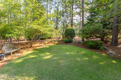 Welcome to this elegant, all-brick custom home built by on Pinewild Country Club of Pinehurst in North Carolina - for sale on GolfHomes.com, golf home, golf lot