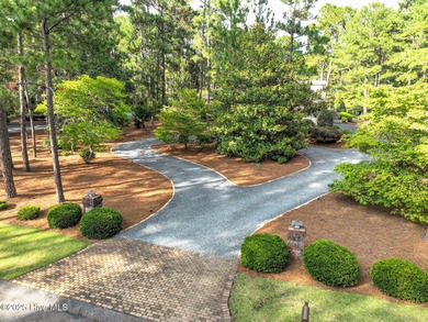 Welcome to this elegant, all-brick custom home built by on Pinewild Country Club of Pinehurst in North Carolina - for sale on GolfHomes.com, golf home, golf lot