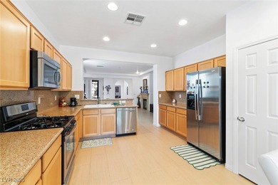 PRISTINE SINGLE STORY VACATION HOME located in Guard Gated Golf on Rhodes Ranch Golf Club in Nevada - for sale on GolfHomes.com, golf home, golf lot