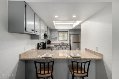 Live in the heart of it all--this updated condo sits in cozy on Stonecreek Golf Club in Arizona - for sale on GolfHomes.com, golf home, golf lot