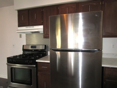 Welcome to this newly renovated, move-in ready condo in St on St. Clair Shores Country Club in Michigan - for sale on GolfHomes.com, golf home, golf lot
