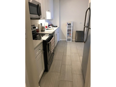 Fully renovated studio with separate den/sleeping area on Sydney R. Marovitz Golf Course in Illinois - for sale on GolfHomes.com, golf home, golf lot