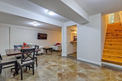 Nestled in Burton Getaways Community, this charming Fee Simple on Waterfall Country Club in Georgia - for sale on GolfHomes.com, golf home, golf lot