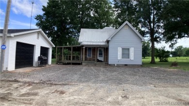 Charming 4-bedroom, 1-bath home in the heart of Tipton! This on Tipton Country Club in Missouri - for sale on GolfHomes.com, golf home, golf lot