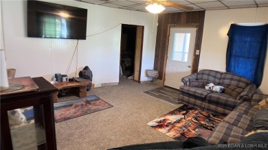 Charming 4-bedroom, 1-bath home in the heart of Tipton! This on Tipton Country Club in Missouri - for sale on GolfHomes.com, golf home, golf lot