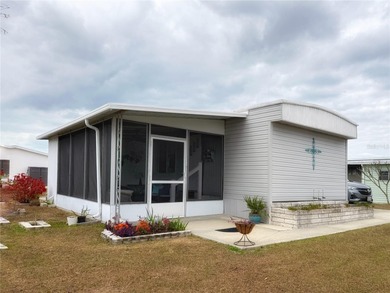 Effortless Florida Living in Caribbean Isles Residential on Apollo Beach Golf and Sea Club in Florida - for sale on GolfHomes.com, golf home, golf lot