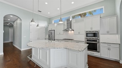 Step into this stunning custom residence in the highly sought on IMG Academies Golf and Country Club in Florida - for sale on GolfHomes.com, golf home, golf lot