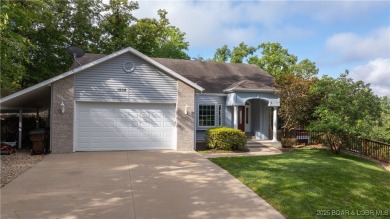 Rare 5-bedroom, 4.5-bath home in Hawk Island Estates! Inside on The Oaks Golf Course in Missouri - for sale on GolfHomes.com, golf home, golf lot