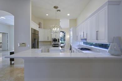 This Egret Lakes estate home offers 5 bedrooms/ 4.5 baths and a on  in Florida - for sale on GolfHomes.com, golf home, golf lot
