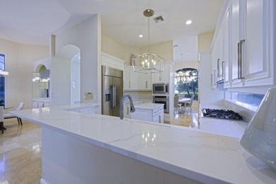 This Egret Lakes estate home offers 5 bedrooms/ 4.5 baths and a on  in Florida - for sale on GolfHomes.com, golf home, golf lot