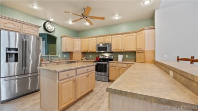 Rare 5-bedroom, 4.5-bath home in Hawk Island Estates! Inside on The Oaks Golf Course in Missouri - for sale on GolfHomes.com, golf home, golf lot