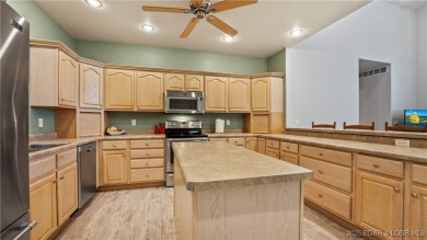 Rare 5-bedroom, 4.5-bath home in Hawk Island Estates! Inside on The Oaks Golf Course in Missouri - for sale on GolfHomes.com, golf home, golf lot