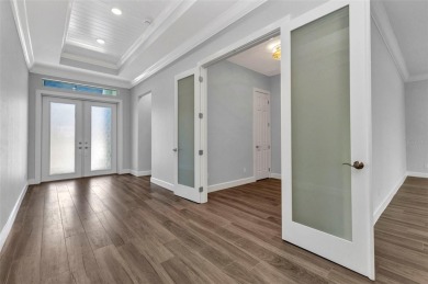 One or more photo(s) has been virtually staged. Welcome to Punta on Saint Andrews South Golf Club in Florida - for sale on GolfHomes.com, golf home, golf lot