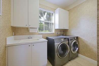 This Egret Lakes estate home offers 5 bedrooms/ 4.5 baths and a on  in Florida - for sale on GolfHomes.com, golf home, golf lot