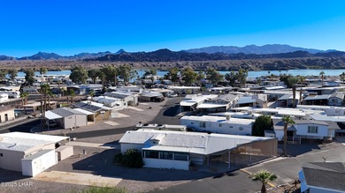 Prime Island Location! This beautifully maintained 3-bedroom on London Bridge Golf Course in Arizona - for sale on GolfHomes.com, golf home, golf lot