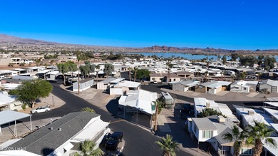 Prime Island Location! This beautifully maintained 3-bedroom on London Bridge Golf Course in Arizona - for sale on GolfHomes.com, golf home, golf lot