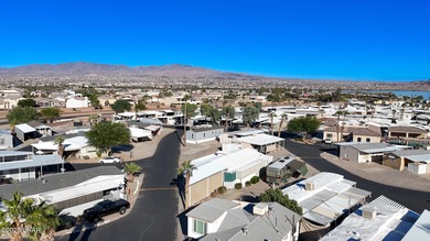 Prime Island Location! This beautifully maintained 3-bedroom on London Bridge Golf Course in Arizona - for sale on GolfHomes.com, golf home, golf lot