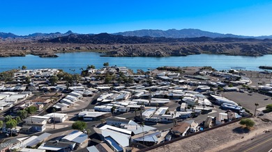 Prime Island Location! This beautifully maintained 3-bedroom on London Bridge Golf Course in Arizona - for sale on GolfHomes.com, golf home, golf lot