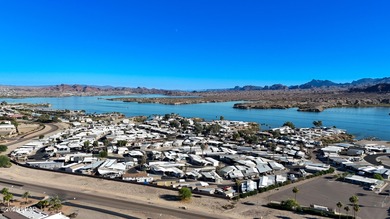 Prime Island Location! This beautifully maintained 3-bedroom on London Bridge Golf Course in Arizona - for sale on GolfHomes.com, golf home, golf lot