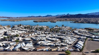 Prime Island Location! This beautifully maintained 3-bedroom on London Bridge Golf Course in Arizona - for sale on GolfHomes.com, golf home, golf lot