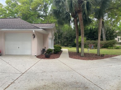Stunning 4- bedroom pool home in a prime family friendly on Rainbow Springs Golf and Country Club in Florida - for sale on GolfHomes.com, golf home, golf lot