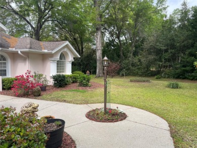Stunning 4- bedroom pool home in a prime family friendly on Rainbow Springs Golf and Country Club in Florida - for sale on GolfHomes.com, golf home, golf lot