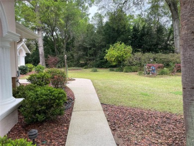 Stunning 4- bedroom pool home in a prime family friendly on Rainbow Springs Golf and Country Club in Florida - for sale on GolfHomes.com, golf home, golf lot