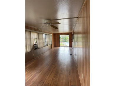 ON THE WATER!! LOW HOA LOW HOA only 219 a month. What a FIND!! a on Cypress Point RV Golf Club in Florida - for sale on GolfHomes.com, golf home, golf lot