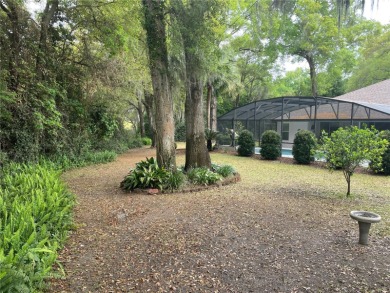 Stunning 4- bedroom pool home in a prime family friendly on Rainbow Springs Golf and Country Club in Florida - for sale on GolfHomes.com, golf home, golf lot