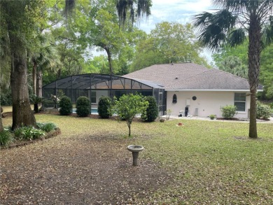 Stunning 4- bedroom pool home in a prime family friendly on Rainbow Springs Golf and Country Club in Florida - for sale on GolfHomes.com, golf home, golf lot