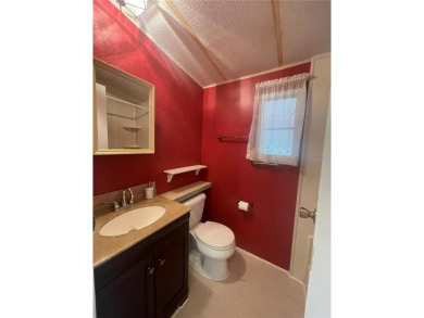 ON THE WATER!! LOW HOA LOW HOA only 219 a month. What a FIND!! a on Cypress Point RV Golf Club in Florida - for sale on GolfHomes.com, golf home, golf lot