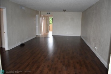 LOVELY CONDO IN QUIET ALL AGES GATED COMMUNITY! INVESTOR on Inverrary Country Club in Florida - for sale on GolfHomes.com, golf home, golf lot