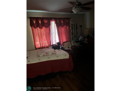LOVELY CONDO IN QUIET ALL AGES GATED COMMUNITY! INVESTOR on Inverrary Country Club in Florida - for sale on GolfHomes.com, golf home, golf lot