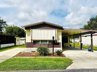 Experience the ultimate combination of comfort and style in this on Hamptons Golf Club in Florida - for sale on GolfHomes.com, golf home, golf lot
