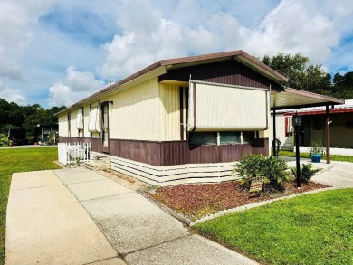 Experience the ultimate combination of comfort and style in this on Hamptons Golf Club in Florida - for sale on GolfHomes.com, golf home, golf lot