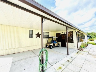 Experience the ultimate combination of comfort and style in this on Hamptons Golf Club in Florida - for sale on GolfHomes.com, golf home, golf lot