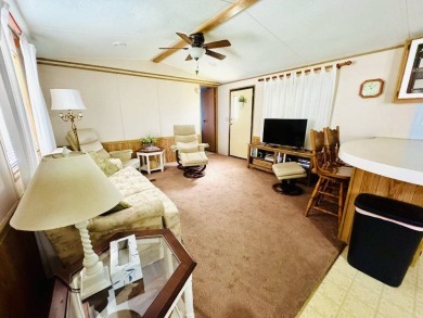 Experience the ultimate combination of comfort and style in this on Hamptons Golf Club in Florida - for sale on GolfHomes.com, golf home, golf lot