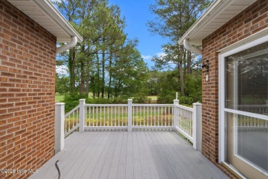 HOME IS WHERE MEMORIES ARE MADE! Family time and gathering of on Meadowlands Golf Club in North Carolina - for sale on GolfHomes.com, golf home, golf lot