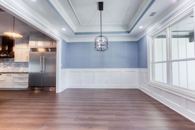 This exquisite custom built home offers 4 spacious bedrooms and on Harbor Club Golf and Country Club in Georgia - for sale on GolfHomes.com, golf home, golf lot