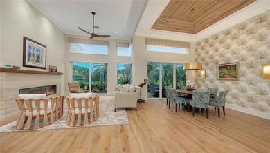 Situated within the gated Queens Harbour enclave of Bay Isles on Longboat Key Golf Club Resort in Florida - for sale on GolfHomes.com, golf home, golf lot