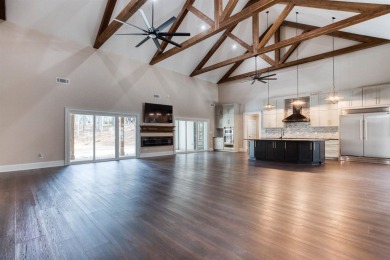 This exquisite custom built home offers 4 spacious bedrooms and on Harbor Club Golf and Country Club in Georgia - for sale on GolfHomes.com, golf home, golf lot
